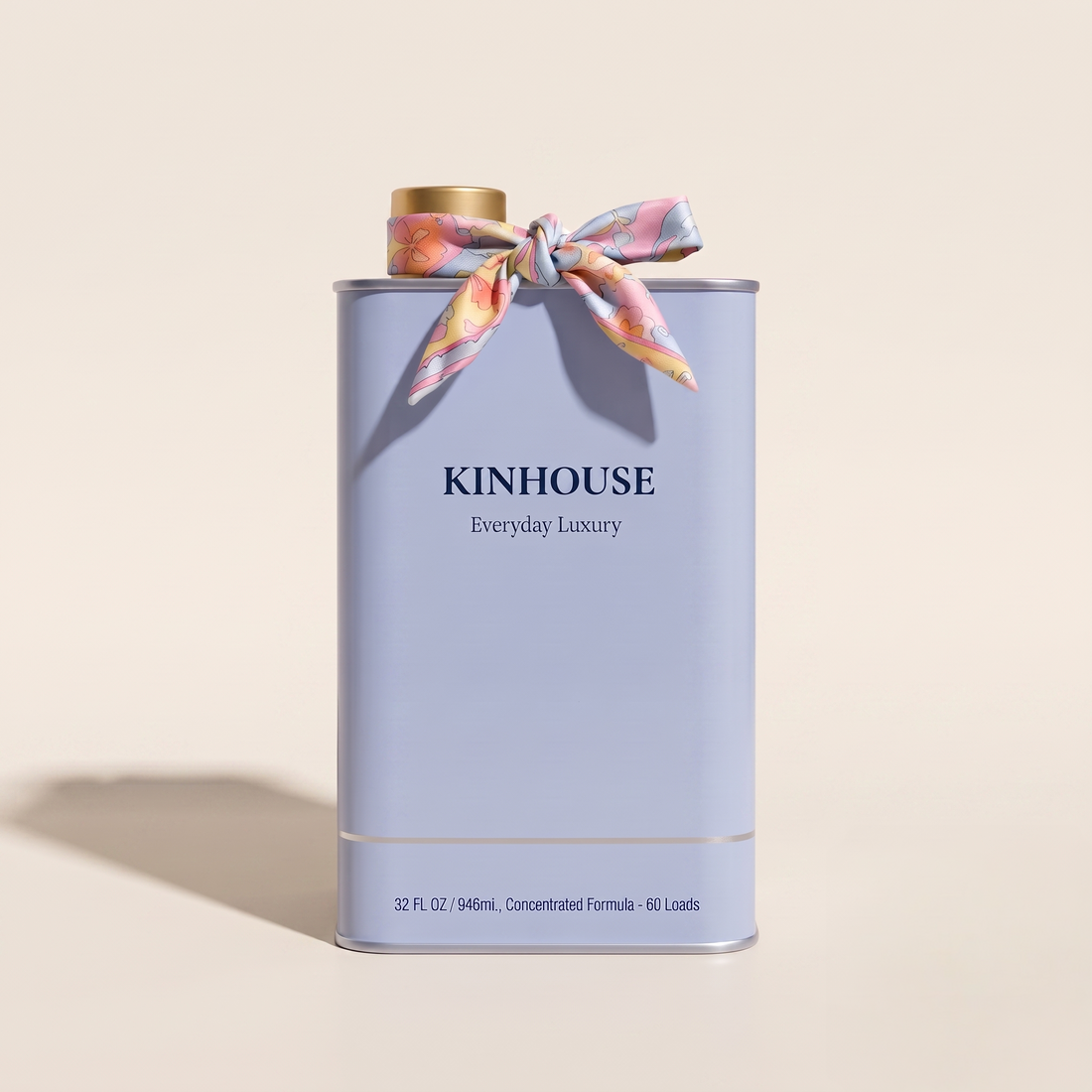 KINHOUSE The Fresh Edit, light blue 32 oz laundry detergent tin with gold cap and floral silk scarf